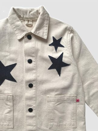 Sustainable kids clothing. Secondhand preloved denim jacket from P Denim. Star denim appliqués. Kids Chore Jacket. Secondhand designer kids clothing.