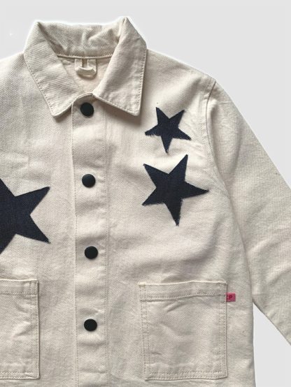 Sustainable kids clothing. Secondhand preloved denim jacket from P Denim. Star denim appliqués. Kids Chore Jacket. Secondhand designer kids clothing.