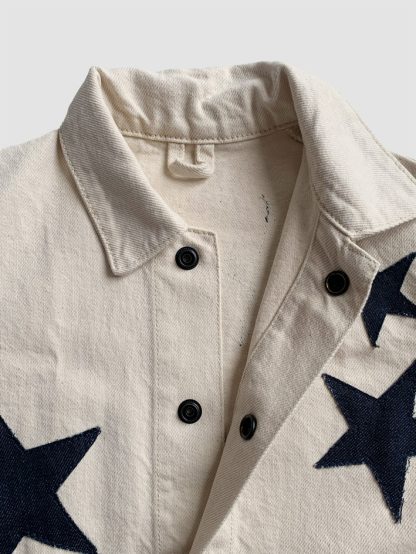 Sustainable kids clothing. Secondhand preloved denim jacket from P Denim. Star appliqués Denim Chore Jacket. Secondhand designer kids clothing.