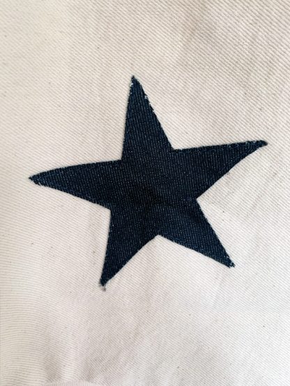 Sustainable kids clothing. Secondhand preloved denim jacket from P Denim. Star denim appliqués. Kids Chore Jacket. Secondhand designer kids clothing.
